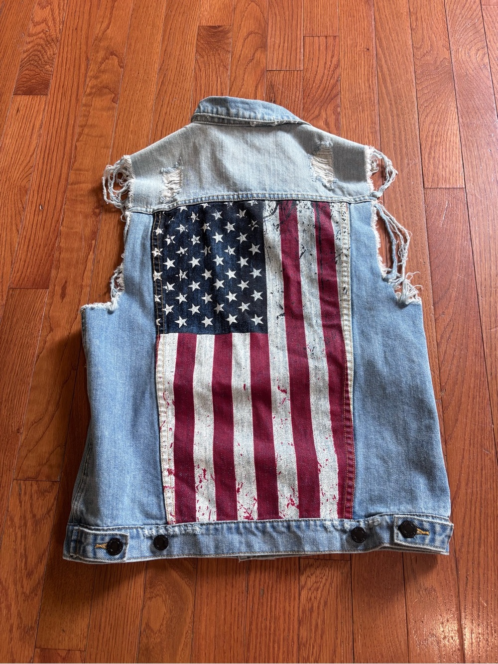 Kittenish Denim Distressed Sleeveless Jacket with American Flag Back. Size Small